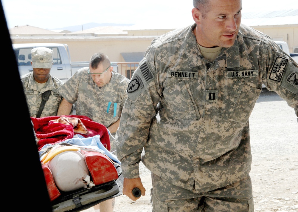 U.S. Medic Rushes Civilian Injured by IED to Forward Surgical Team in Afghanistan