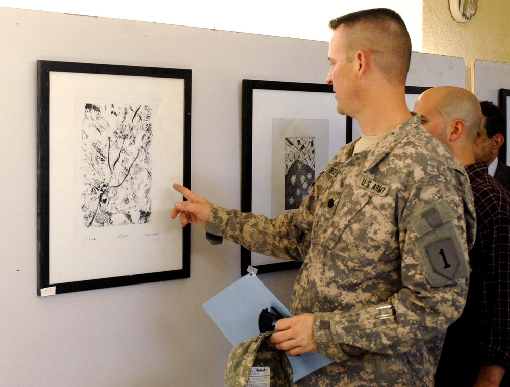 Army Officer Inspects Student Art at Baghdad School