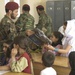 Afghan Commandos Distribute School Supplies to Children in Kandahar