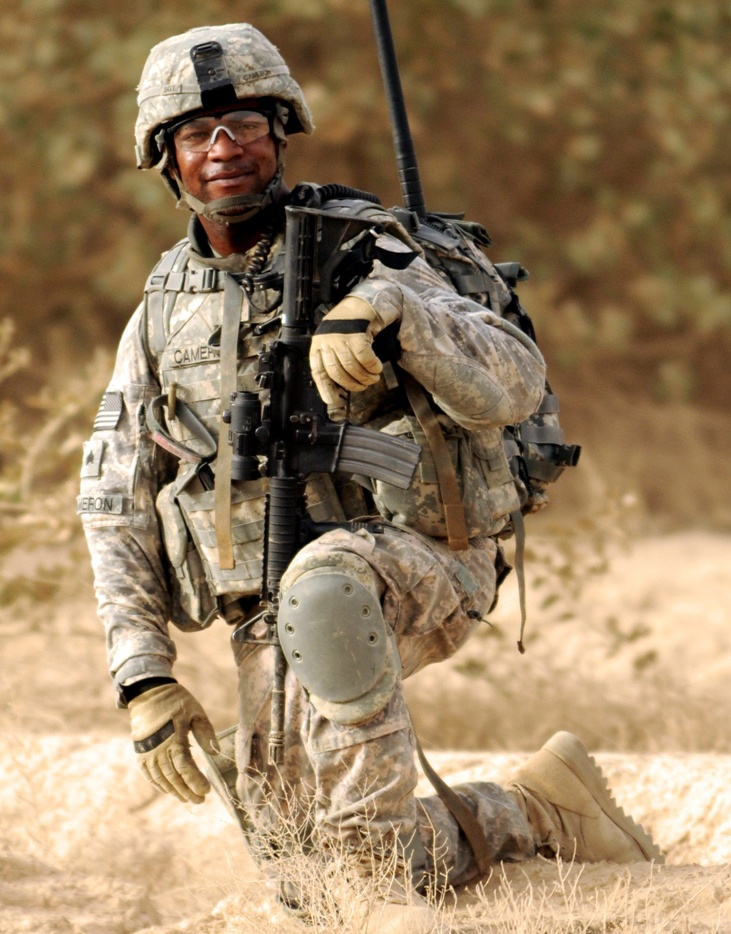 National Guard Medic Cares for Military Working Dog in Iraq