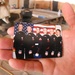 Navy Petty Officer Holds Photo of Family Members Serving in Military