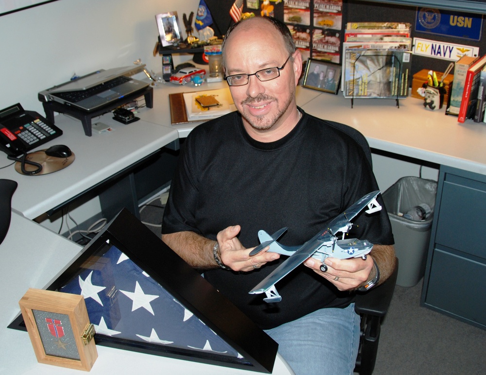 Defense Logistics Agency Official Honors Father's WWII Service with Catalina Seaplane Model