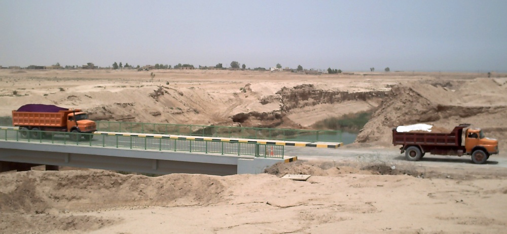 Trucks Cross Newly Reopened Mujarrah Canal Bridge in Iraq's Anbar Province