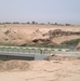 Trucks Cross Newly Reopened Mujarrah Canal Bridge in Iraq's Anbar Province