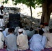 Afghan Students Learn Outdoors to Escape Summer Heat