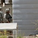 Army Staff Sgt. Inspects Water Reservoirs at Children's Hospital Construction Site in Basra, Iraq