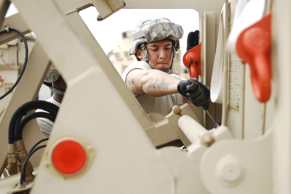 Army Pfc. Assembles Mobile Spare-Parts Unit in Afghanistan