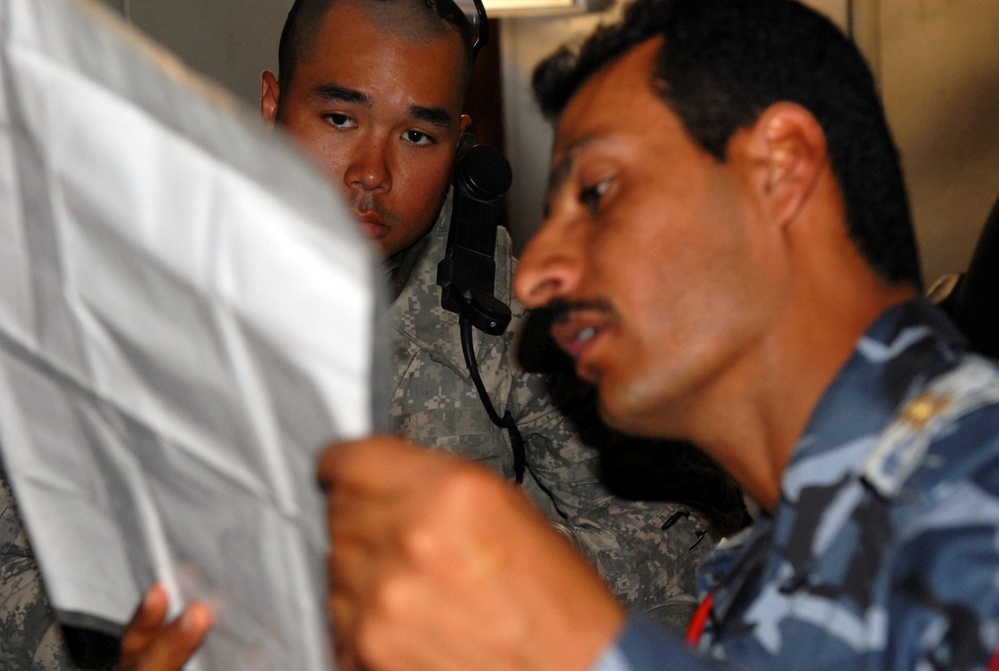 U.S. Army Officer Collaborates with Iraqi Counterpart in Basra