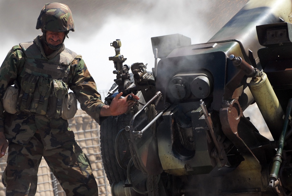 Afghan Artilleryman Fires D-30 Howitzer During Training in Afghanistan