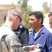 U.S. Army Officer Honors Iraqi Policeman for Vehicle Maintenance