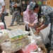 Iraqi Officials Distribute UN Relief Food to Widows in Taji