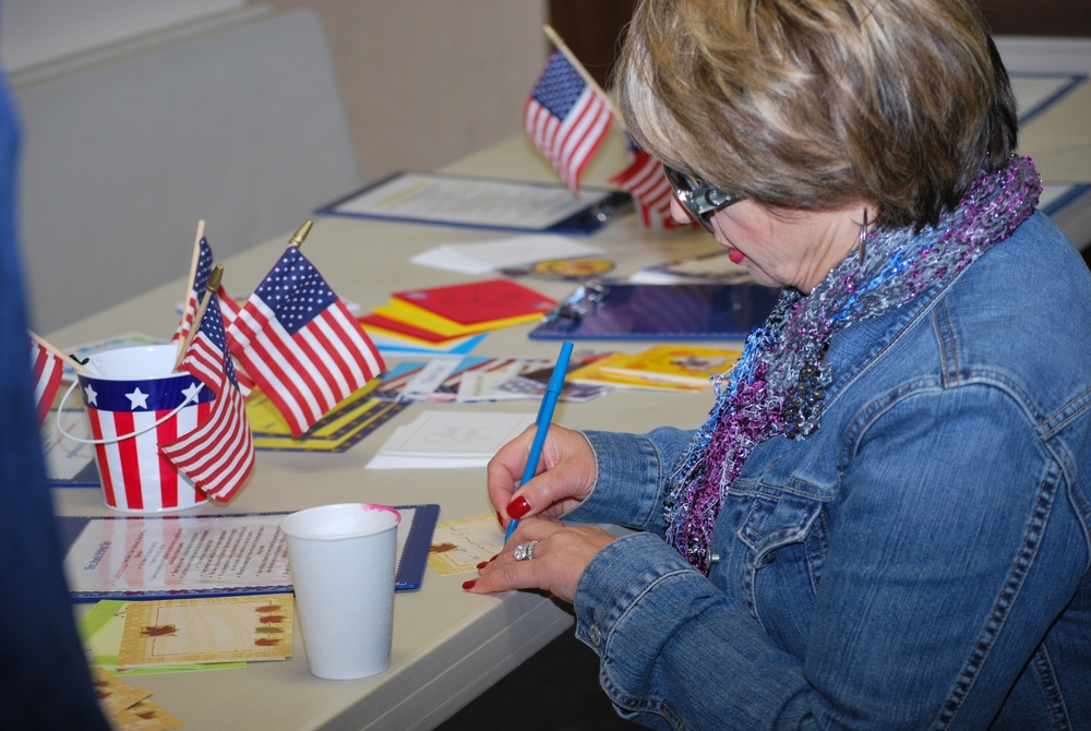 Volunteer Pens Heartfelt Letters for Deployed Troops