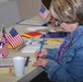Volunteer Pens Heartfelt Letters for Deployed Troops