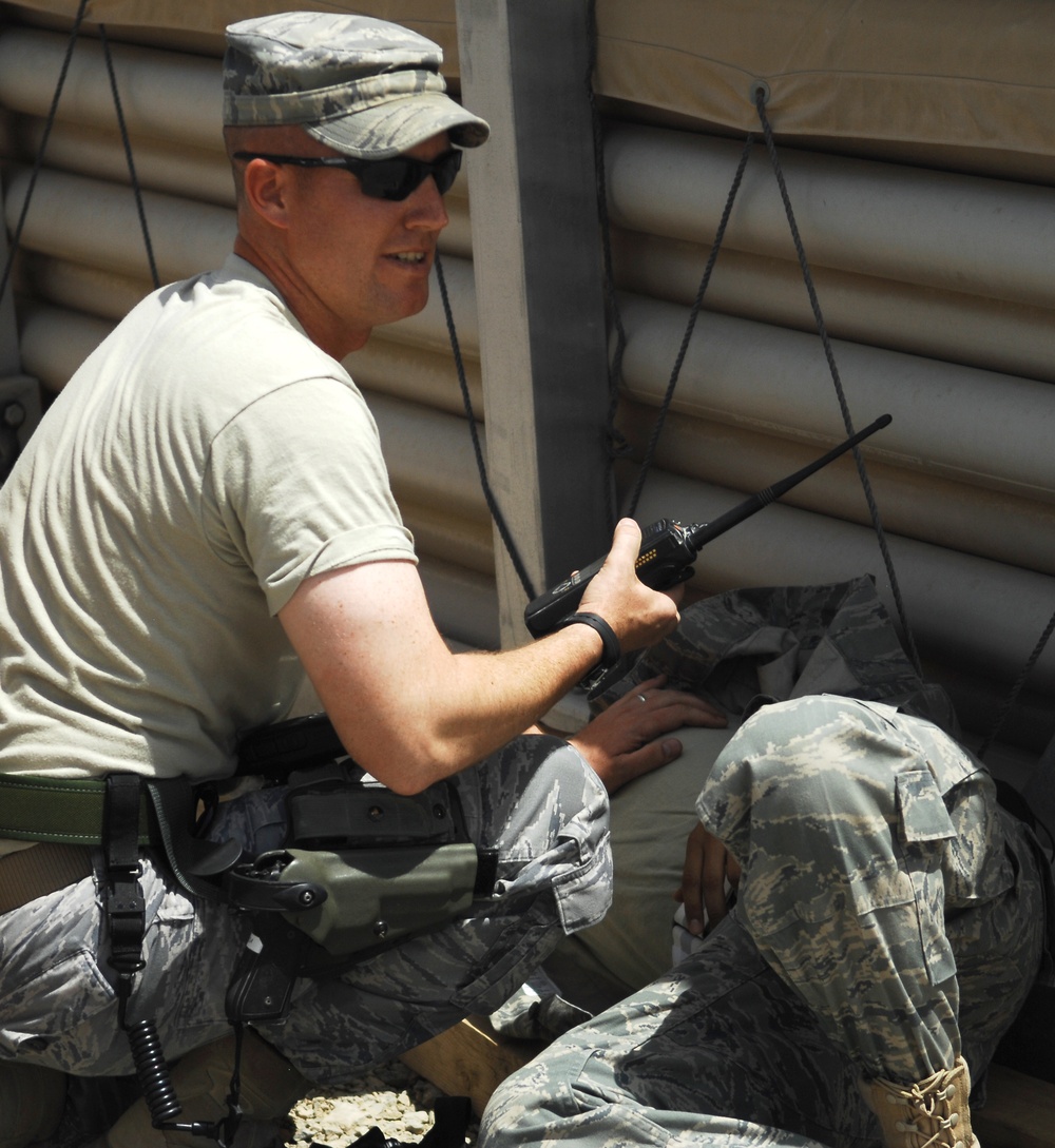 Tech Sgt. Dickey Evaluates Simulated Wounds in Mass-Casualty Exercise