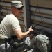 Tech Sgt. Dickey Evaluates Simulated Wounds in Mass-Casualty Exercise