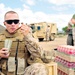 Marine Refuels with Field Ration During Weapons Training in Djibouti