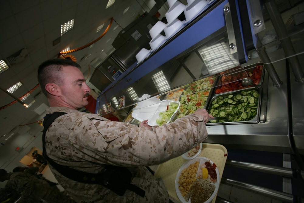 Marine Gunnery Sgt. Serves Himself Salad at Iraq Dining Facility