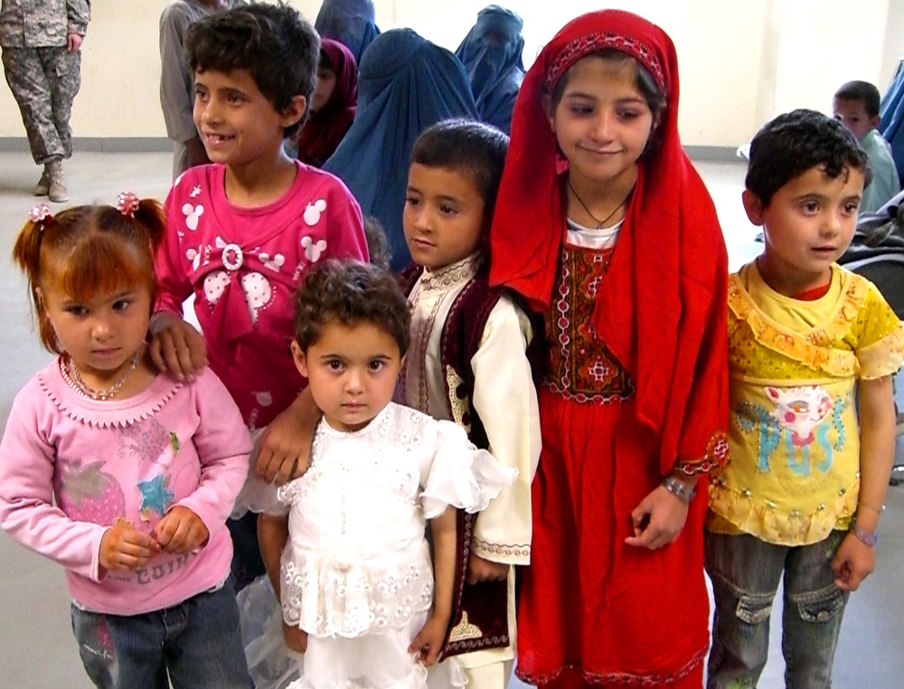 Afghan Children Pose for Female Soldiers at Kandahar Hospital Clinic