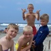 Military Children Surf and Pose at 'Little Warriors' Camp