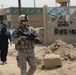 U.S. Soldier Patrols Taji Market with Iraqi Police