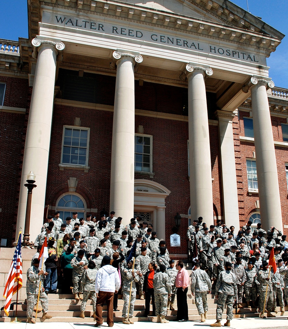 Troops and Civilians Gather for Group Photo at Historic Walter Reed Army Medical Center