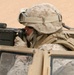 Marine Corps Corporal Prepares .50-Caliber Machine Gun for Test Fire in Iraq