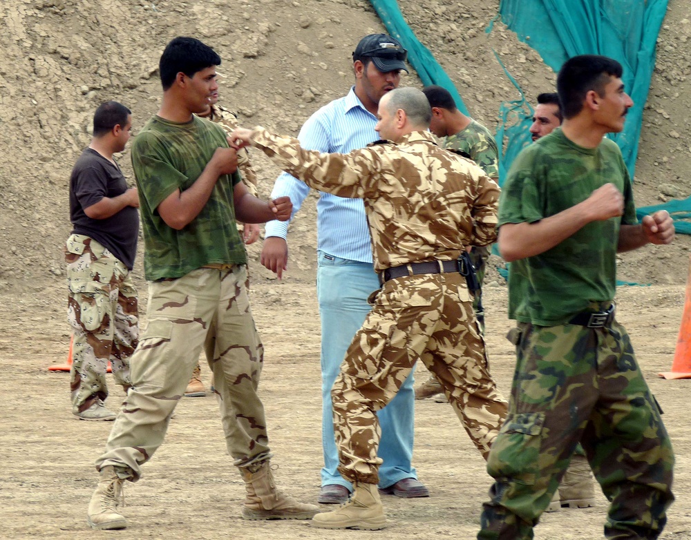 Romanian Soldiers Teach Karate to Iraqi Troops During Combat Training in Iraq