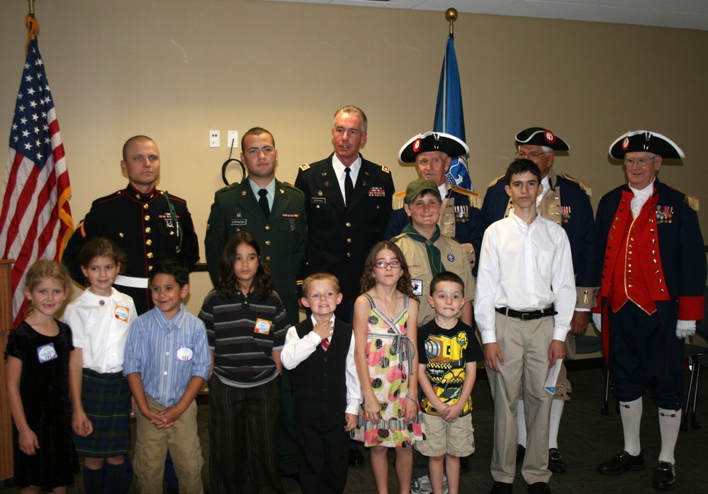 Military Personnel Sworn in as U.S. Citizens During 'Take Your Child to Work Day'