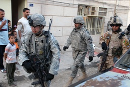 U.S. Troops Patrol Baghdad Neighborhood with Iraqi Forces