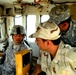 U.S. Soldier Trains Iraqi Counterpart on Bulldozer Operation