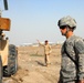 U.S. Soldier Oversees Iraqi Troops' Heavy Equipment Maneuvers