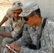U.S. Soldier Practices Arabic with Iraqi Counterpart