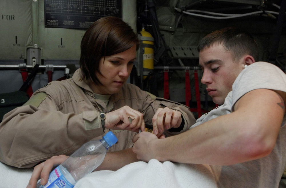 Air Force Flight Nurse Provides Care During Aeromedical Evacuation to Afghanistan