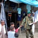 Afghan Soldier Shares Information with Local Children in Alasay Valley