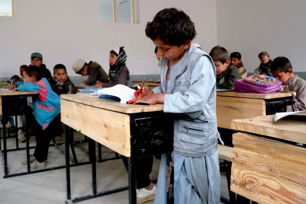 Afghan Students Receive School Supplies from Joint Civilian-Military Team