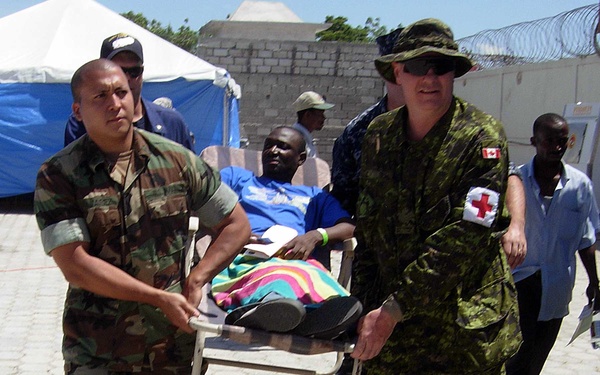 U.S. and Canadian Forces Provide Medical Aid to Haitians in Port-au-Prince