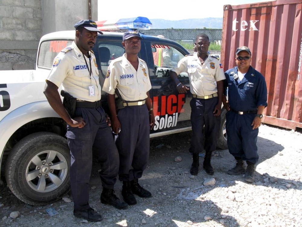 Navy Petty Officer Helps Direct Crowds at Haitian Medical Sites