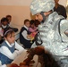 Army Sergeant Distributes School Supplies to Iraqi Students