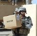 Sgt. Deutsch Helps Unload Supplies for Baghdad School