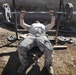 Soldier Lifts Weights at Remote Afghan Outpost