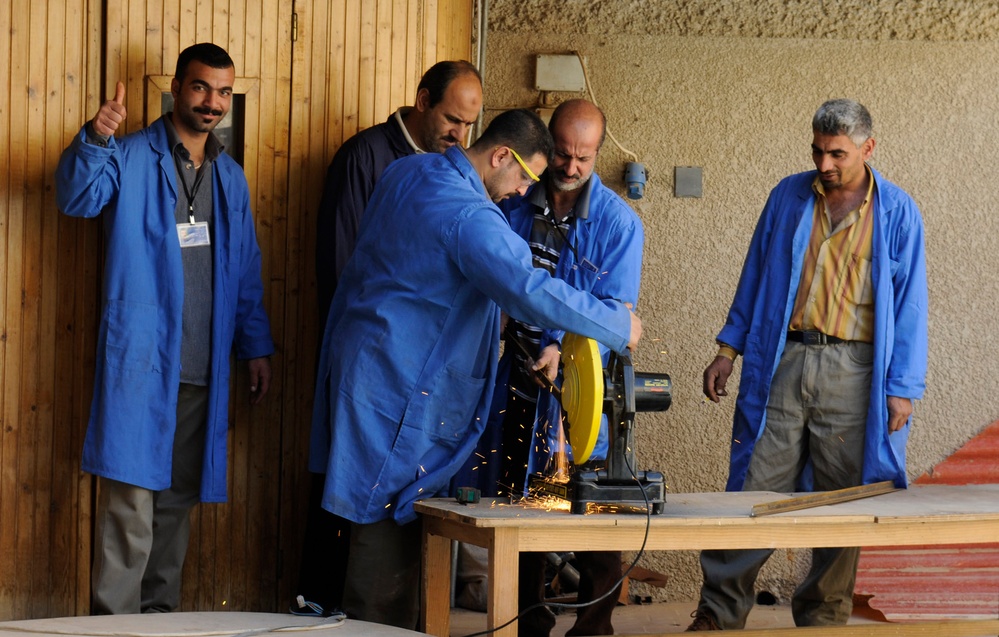 Former 'Sons of Iraq' Members Learn Mechanical Skills at Reintegration Center