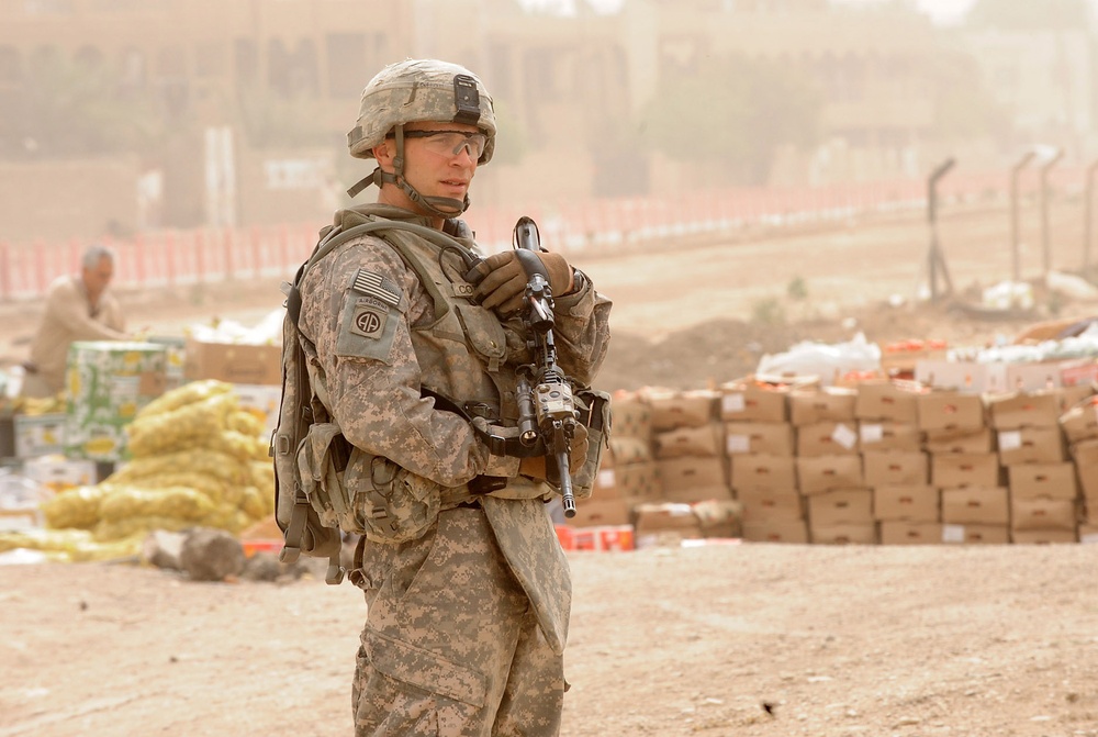 Army Sgt. Communicates During Route-Clearance Operation in Baghdad
