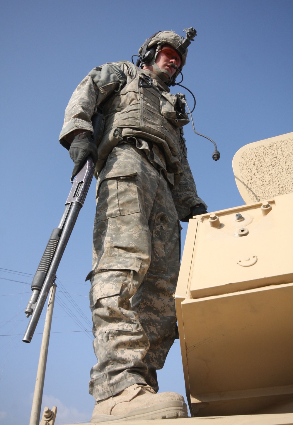 U.S. Soldier Stands Guard at Bagram Airfield Checkpoint in Afghanistan