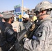 Afghan Police Captain Briefs U.S. Army Lieutenant at Checkpoint