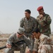 U.S. Soldier Trains Iraqi Counterparts on Antenna Setup