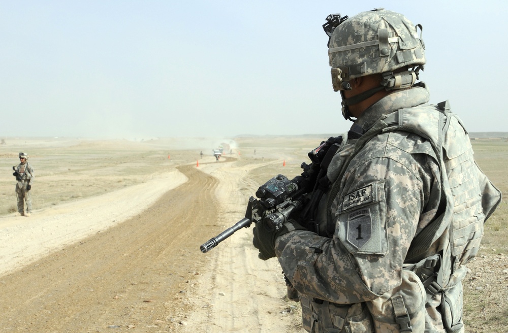 U.S. Soldier Oversees Afghan Police Traffic Stop in Southern Afghanistan