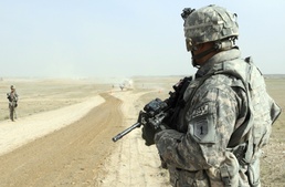 U.S. Soldier Oversees Afghan Police Traffic Stop in Southern Afghanistan
