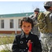 Afghan Girl Receives School Supplies from U.S. Troops
