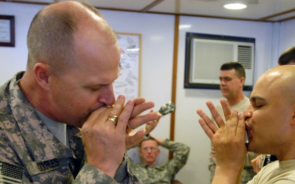 Army Chaplain and Soldier Engage in Harmonica Duel for Baghdad Bad Boys Band