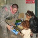 U.S. Soldier Distributes Toys to Iraqi Children During Humanitarian Mission